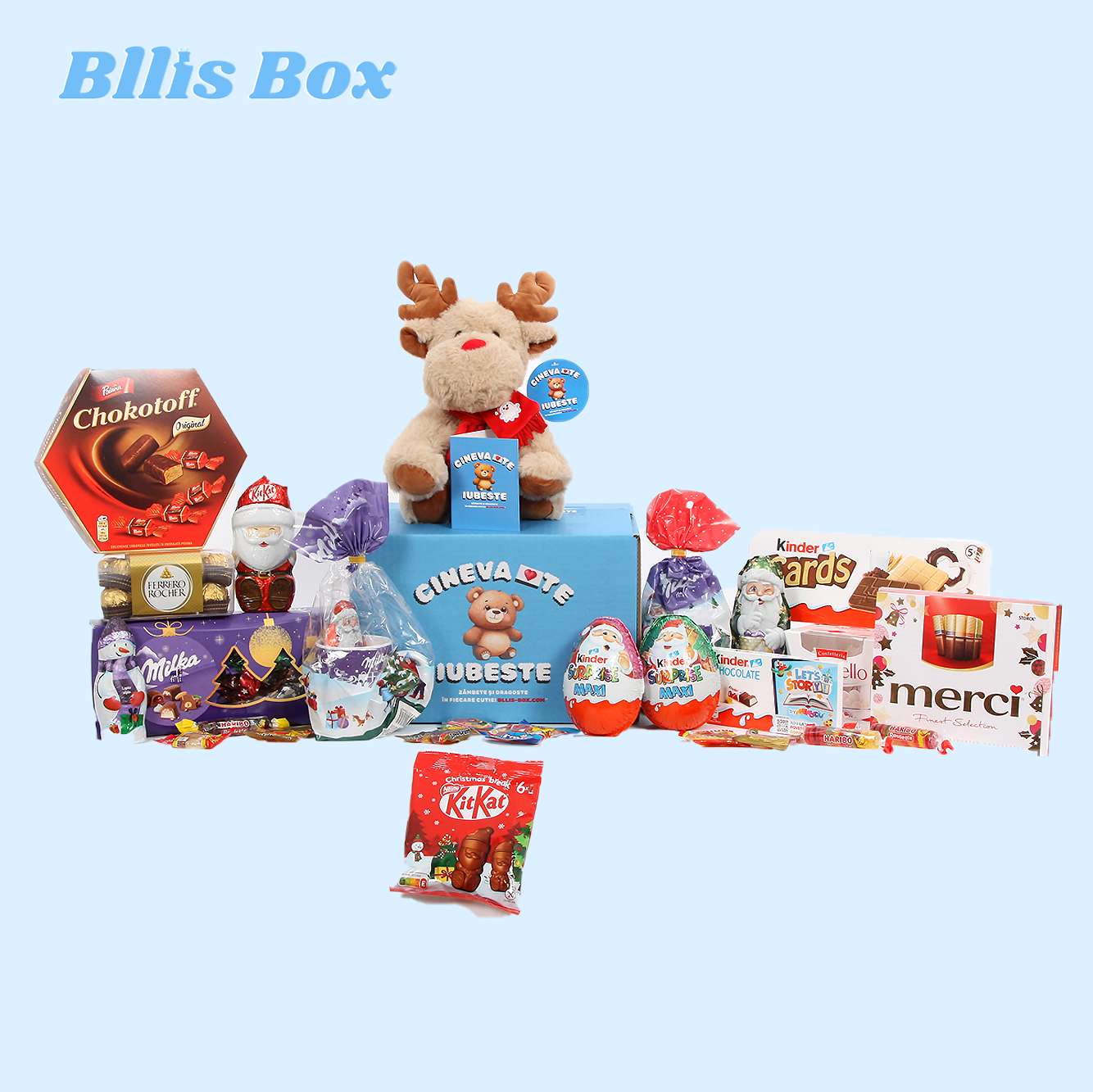 Cutie Deluxe cu ren de pluș festiv, dulciuri premium Kinder, Milka, Ferrero și KitKat, pe o cutie albastră cu mesajul „Cineva te iubește” – cadoul perfect pentru sărbători.